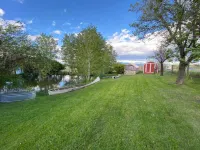 Cozy cabin nestled beside a spring-fed pond&hobby farm in the Elkhorn Mountains