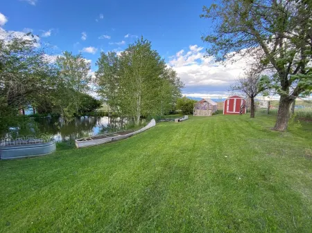 Cozy cabin nestled beside a spring-fed pond&hobby farm in the Elkhorn Mountains