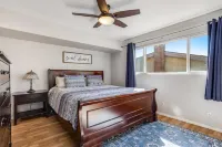 Relax at this Family Home w/ Solar heated Pool & Game Room. Close to everything!