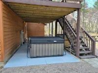 Cabin in the woods with hot tub and lake views. Pets welcome! Close to Nordic.