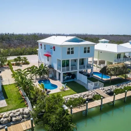 Discount Available! 4 Br/3 BA Private Pool/Dock/Canal Front/Neighborhood Beach!