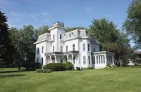 Historic Victorian farmhouse house on 10 acres in the FLX. Hotels near Marcellus Park