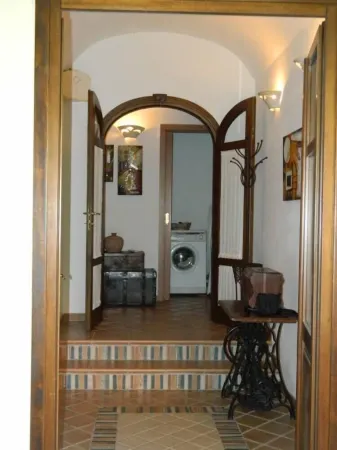 HOUSE WITH VERANDA AT A FEW STEPS FROM THE SEA Отели рядом с достопримечательностью «Supramonte di Baunei»