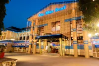 Treebo the Blue Roof Hotels near Shree Manovanchhit Hanuman Mandir.