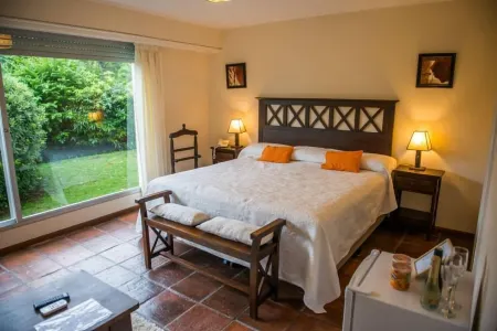 Petit Chateau Hotel Boutique Отели рядом с достопримечательностью «Agro Jardin»