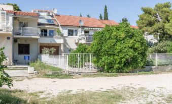 Beachfront Apartment with Balcony and Parking