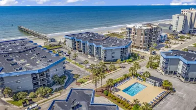 Private Balcony and Shared Pool Access - Stunning Beachfront Oasis Hotels near Xanadu II