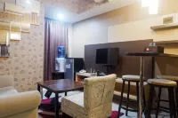 Minimalist 2Br Apartment at Tamansari Papilio Hotels in Gayungan