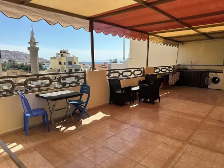 Relax House for Studio Rooms Apartment Отели в г. Акаба