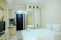 Simply Studio Room at Grand Serpong Apartment by Travelio
