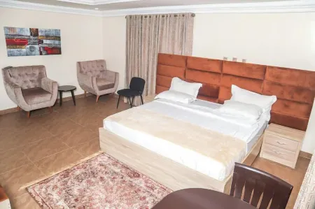 Muna Hotels Отели в г. Джимета