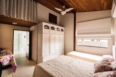 Best location in Caraguá with pool - 5 bedrooms - Up to 20 people Hotels near Cocanha Beach