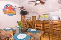 Stay at the famous Jolly Octopus Beach Bar! Beach Front with Water toys included