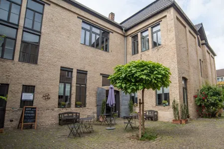 Loft apartment in a historic factory ambience Отели рядом с достопримечательностью «Johannisberg Castle»