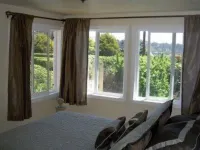 Beach Retreat House w/Ocean Views, Covered Hot Tub, & Large Fenced Yard