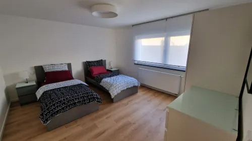 Modern, newly built vacation apartment with large covered balcony and view