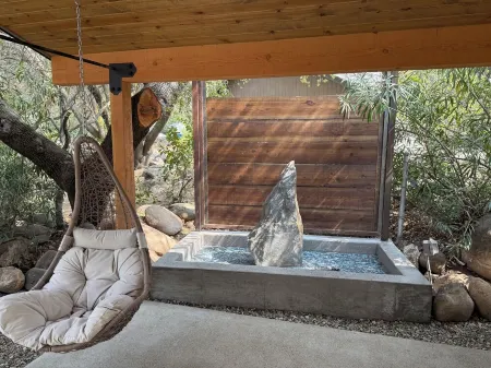 Three Oaks, an enchantingly designed home with cozy guesthouse!