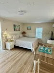 Palm Cottage - Sleeps 4 - Escape the Cold; Our Pool IS Heated!