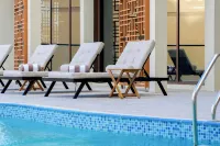 Golden Tulip Muscat The Village - de playa