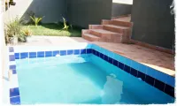Suítes de Setiba - Hospedaria Oca Ruca - homestay