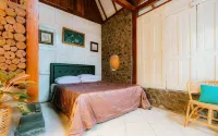 The Riverside Javanese Cottages Отели в г. Pakem