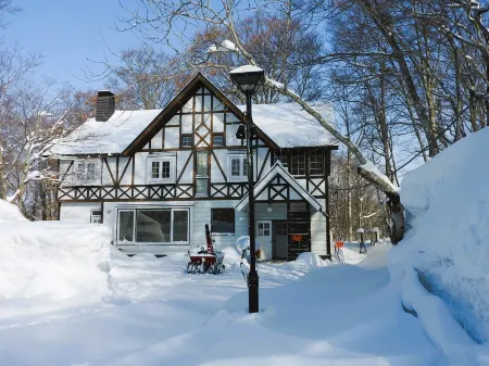 Coffee Cup Milky Kan Отели в г. Нумата