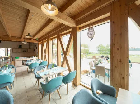 Beech Resort Plauer See Отели в г. Фюнфзеен