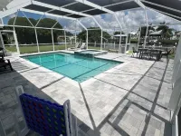 Relaxing Apollo Waterfront Retreat I Pool l Spa l Dock I Firepit Hotels in Apollo Beach