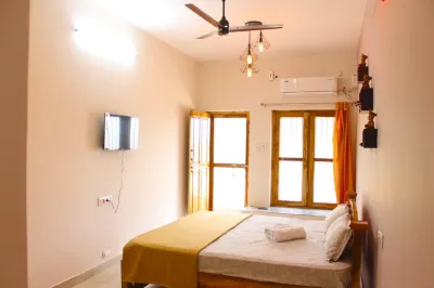 Dwaraka Guest House Hotels near Vedapureeswarar Temple