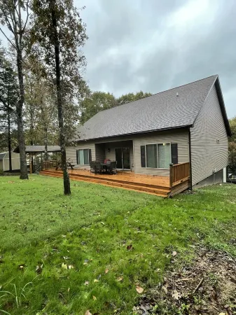 House located on Golf Course, community pools, hiking and ATV trails, close to G