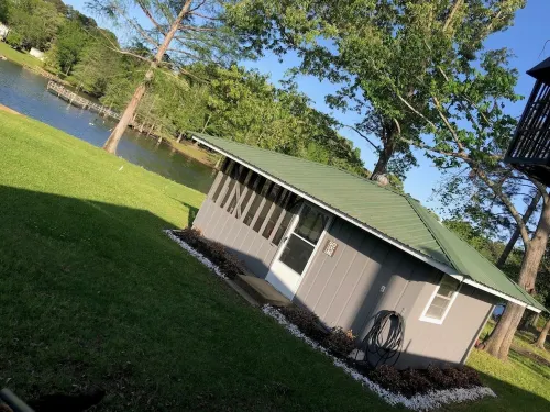 Lake front home in secluded neighborhood mins away f/ boat launch and amenities.