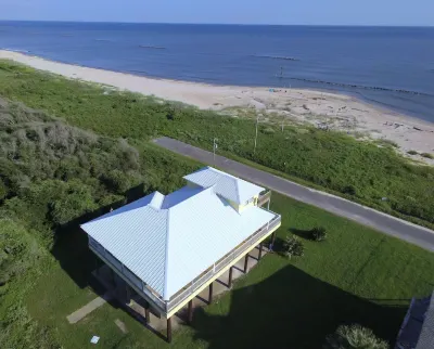 Stunning Oceanfront Beach House near Holly Beach w/balcony & awesome beach decor