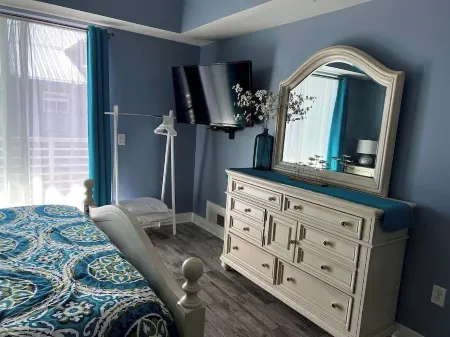 Grand Haven Family Getaway: Stylish Condo, Walk to Beach & Downtown