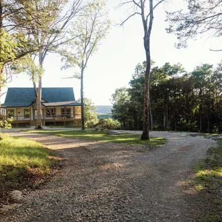 Huckleberry Hollow, secluded home in the woods, wraparound porch, soaker tub!