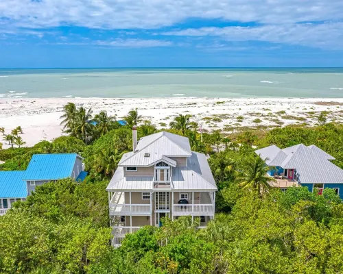 BEACHFRONT, HEATED POOL, KAYAKS/SUP, LANAI W/ GULF VIEWS, 85' DOCK, 2 GOLF CARTS 캡티바 호텔