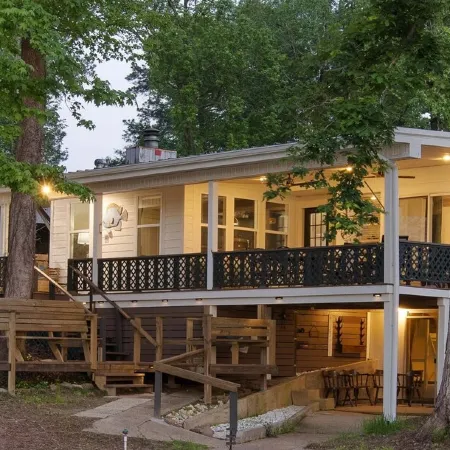 Newly Renovated Lakefront home with boat house, launch and 2 piers!