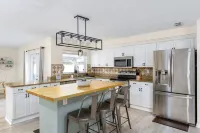 Heated Safe Family Pet Friendly Pool Home Near the Beaches Sleeps 12 Fire Pit