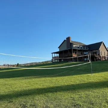 New listing! Hanson House- 9 bed 7.5 bath Sleeps 35. 1/2 Acre Grass Yard