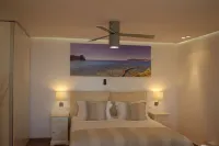 The Infinity 180 Luxury Suites Hotels in Votsi