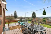 Elegant French Tudor Retreat with Stunning City Views!