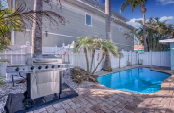 Heated Pool and Steps to the Beach Await - Charming Villa Retreat