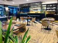 Burnett Riverside Hotel - Quầy bar