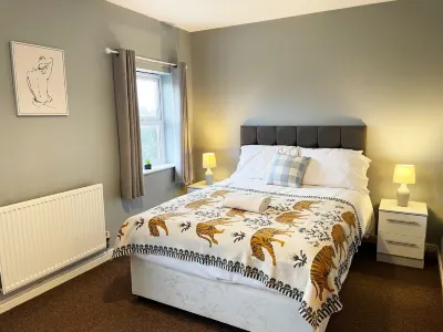 Johnson Townhouse Hoteles cerca de Hinwick House