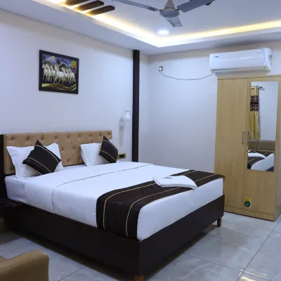 Gokulam Grand Hotels near Kailasa Kona falls