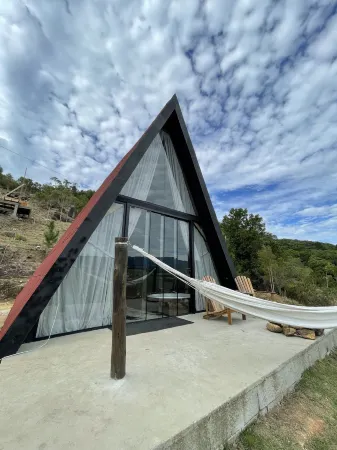 Vale dos Saltos Chalés Отели в г. Тижукас