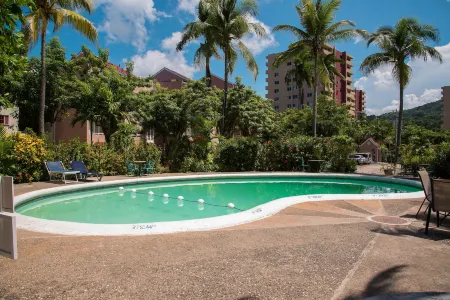 Emerald Corner at Fishermans Point Отели рядом с достопримечательностью «Тертл Ривер Фолс & Гарденс»