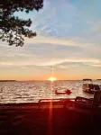 New Listing! Lake front cottage with 100' of private sandy beach