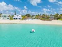 7 Mile Beach Beach Penthouse. Ocean views from Roof Terrace and a Pool Pavilion