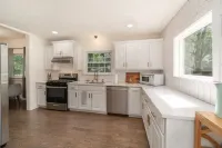 Make beautiful music and sleep up to 14 in this modern-century home!