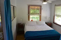 Private, beachfront house on 2.5 acres with fruit trees, owners nextdoor to help